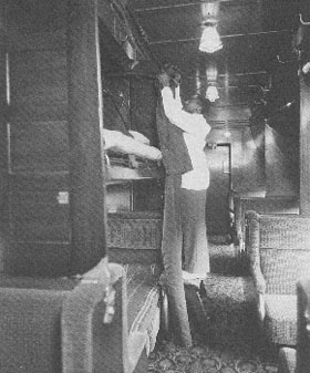Pullman Porter makes a bed (New York Central photo)